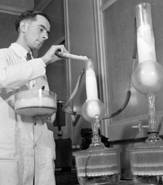 Scientist purifying penicillin, England 1943
