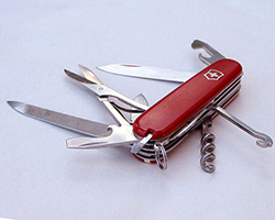 Swiss army knife with several of the tools unfolded.