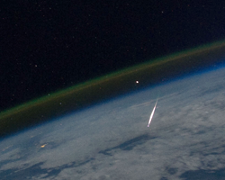 Shooting star photographed in low earth orbit by the ISS