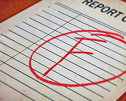 A report card showing an &quot;F&quot; grade