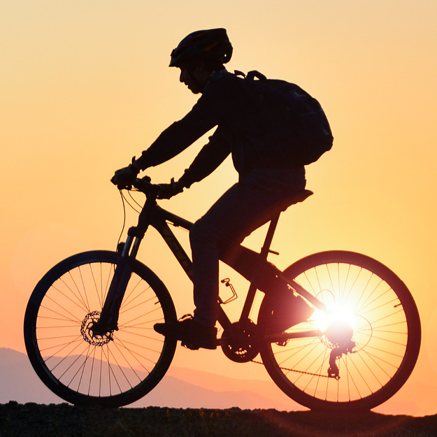 A person riding a bike.