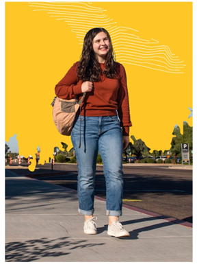 A student carrying a backpack, walking on campus