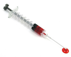 A syringe containing blood.