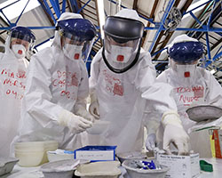Ebola medics practicing methods
