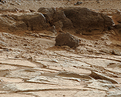 An image of the flat rocks at Point Lake, on Mars