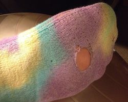 holed used sock