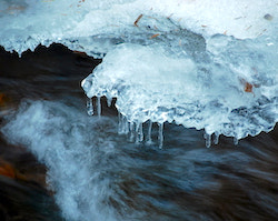 Close up of an ice shelf on an icy river