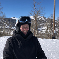 Kerry Hamilton in ski gear on a snowy mountain.