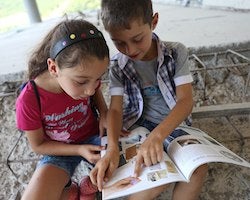 Two kids reading