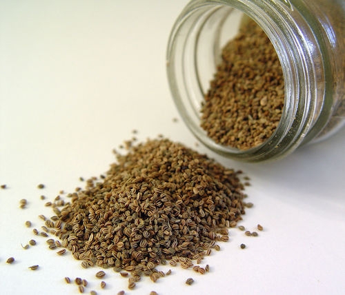 Celery seeds falling out of a jar