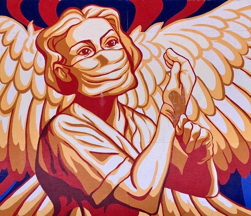 um profissional de saúde desenhado como um anjo