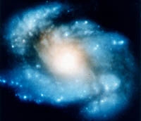 spiral galaxy M100 blurry hubble telescope image