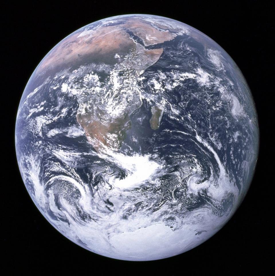 An image of Earth from space, links to Top Question page